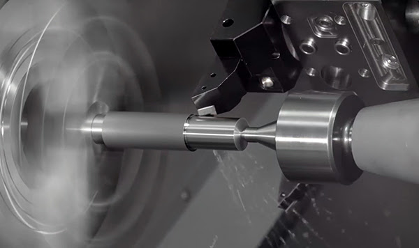 Обработка с поджимом задней бабкой