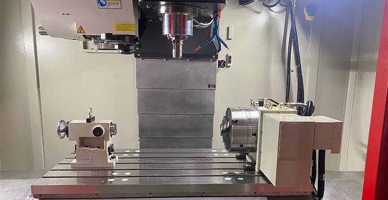 Вертикальный станок с поворотным столом и задней бабкой